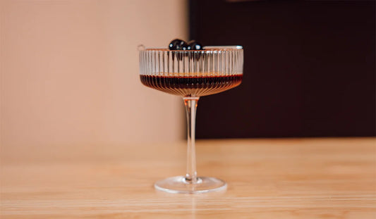 Takamine Black Manhattan in a cocktail glass