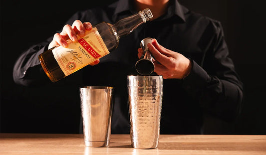 Bartender making a Takamine DC Tea Cocktail