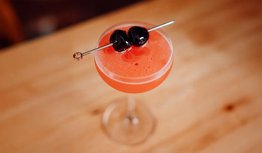 A Ward Eight drink in a cocktail glass on a table